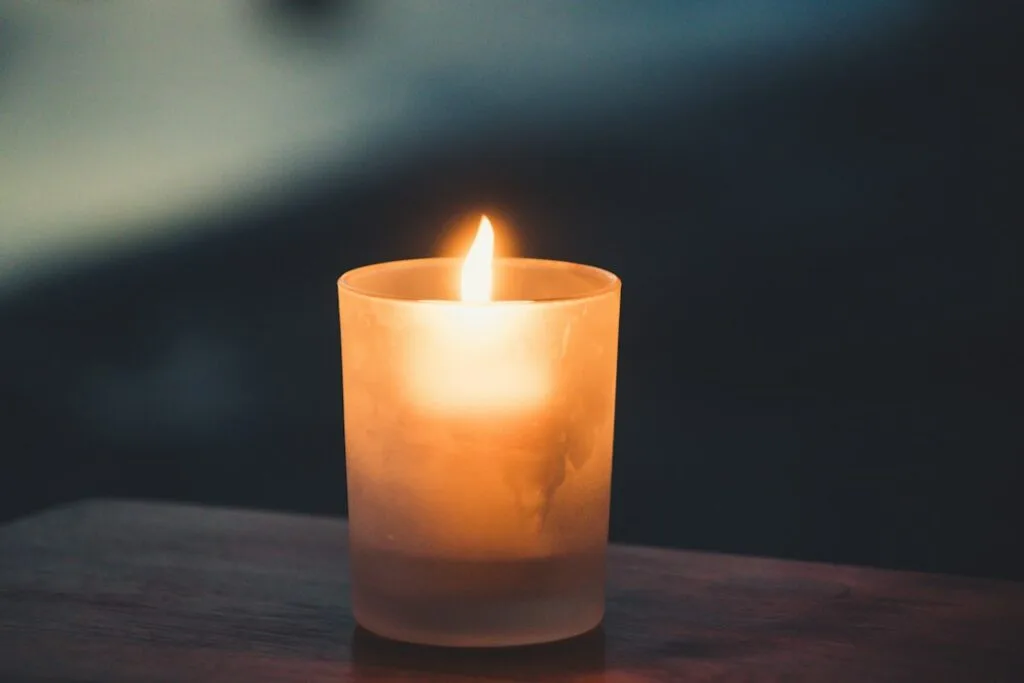 a candle flame in the dark